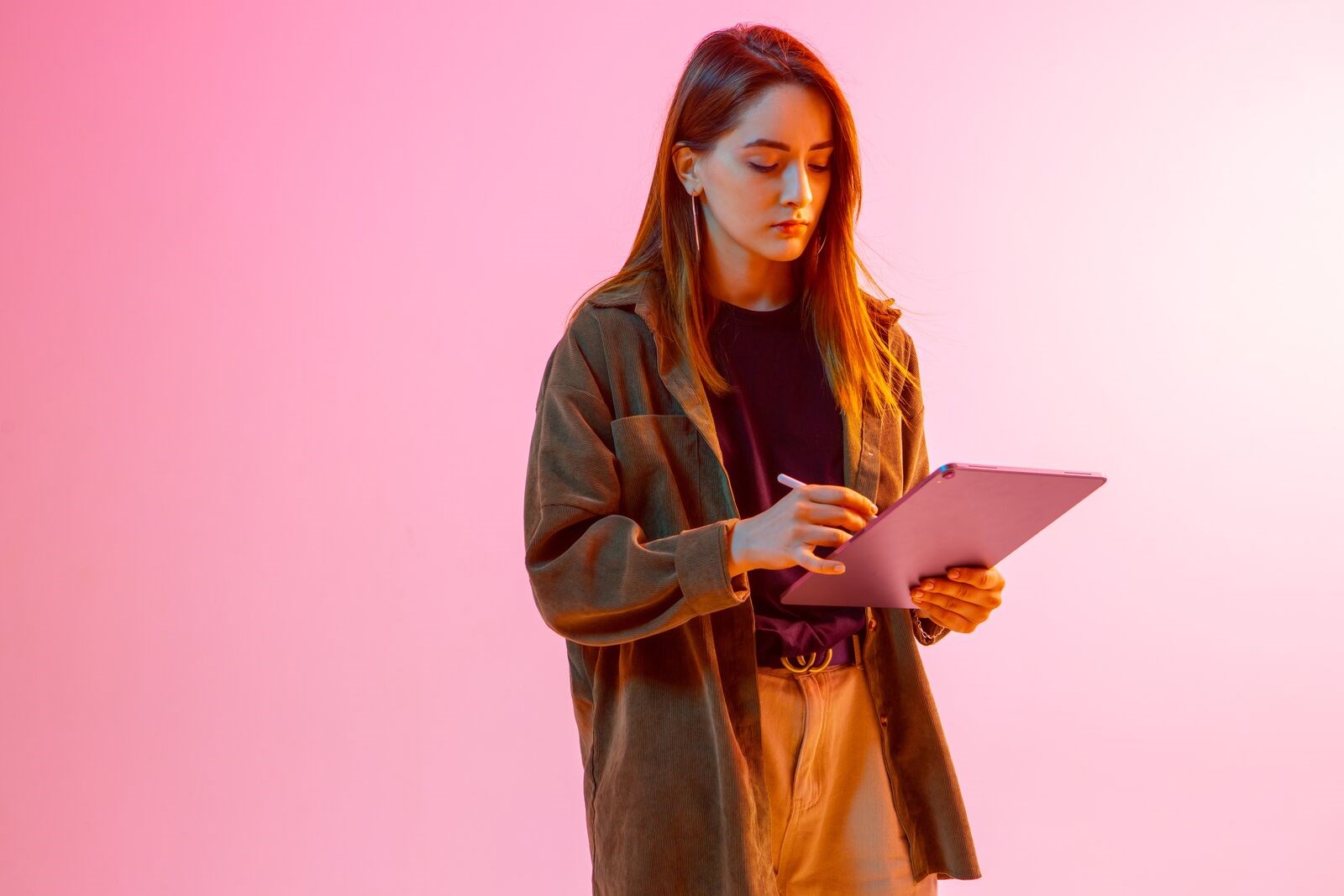 woman-laptop-pink-background.png