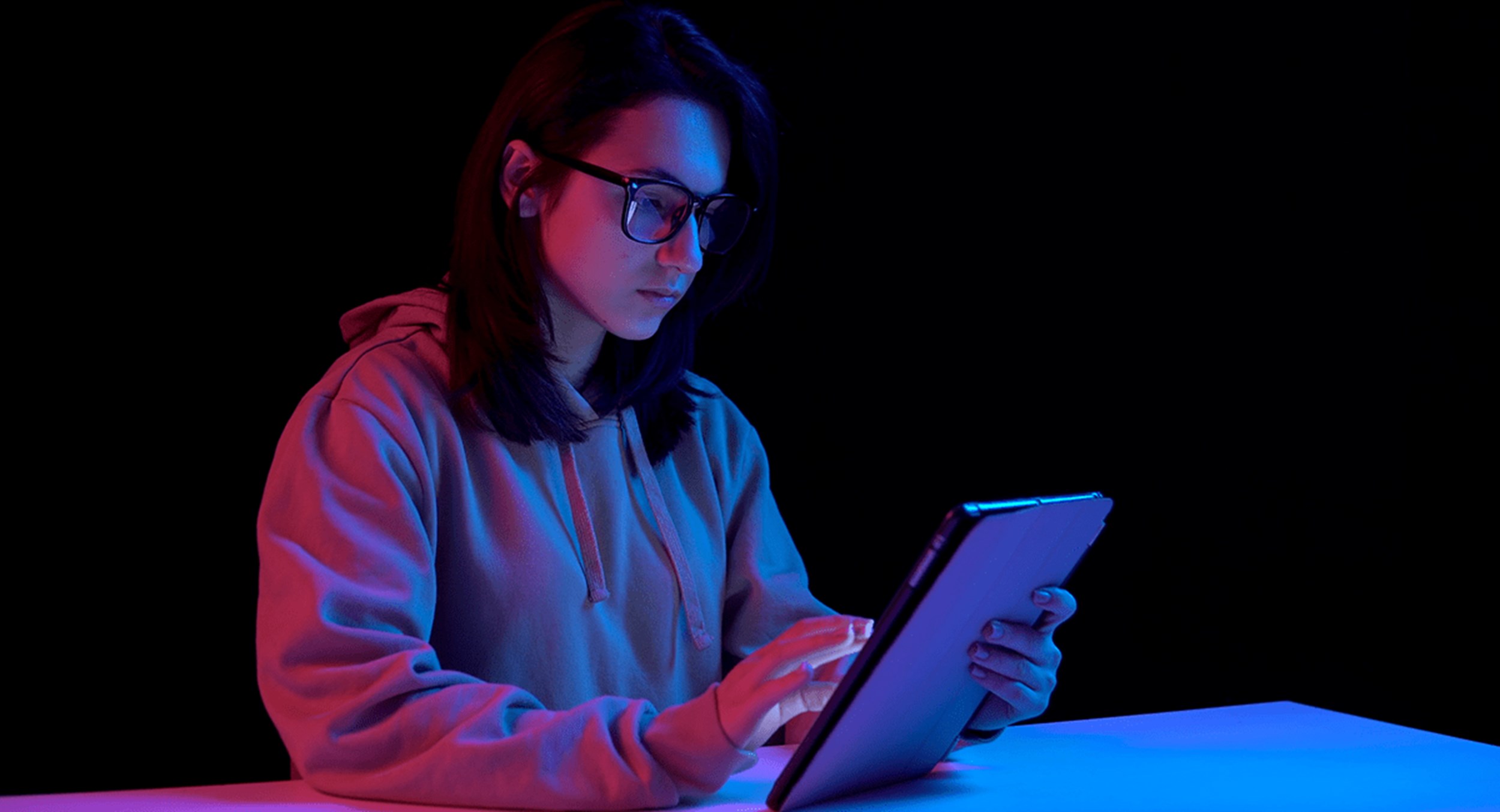 Woman working at her tablet