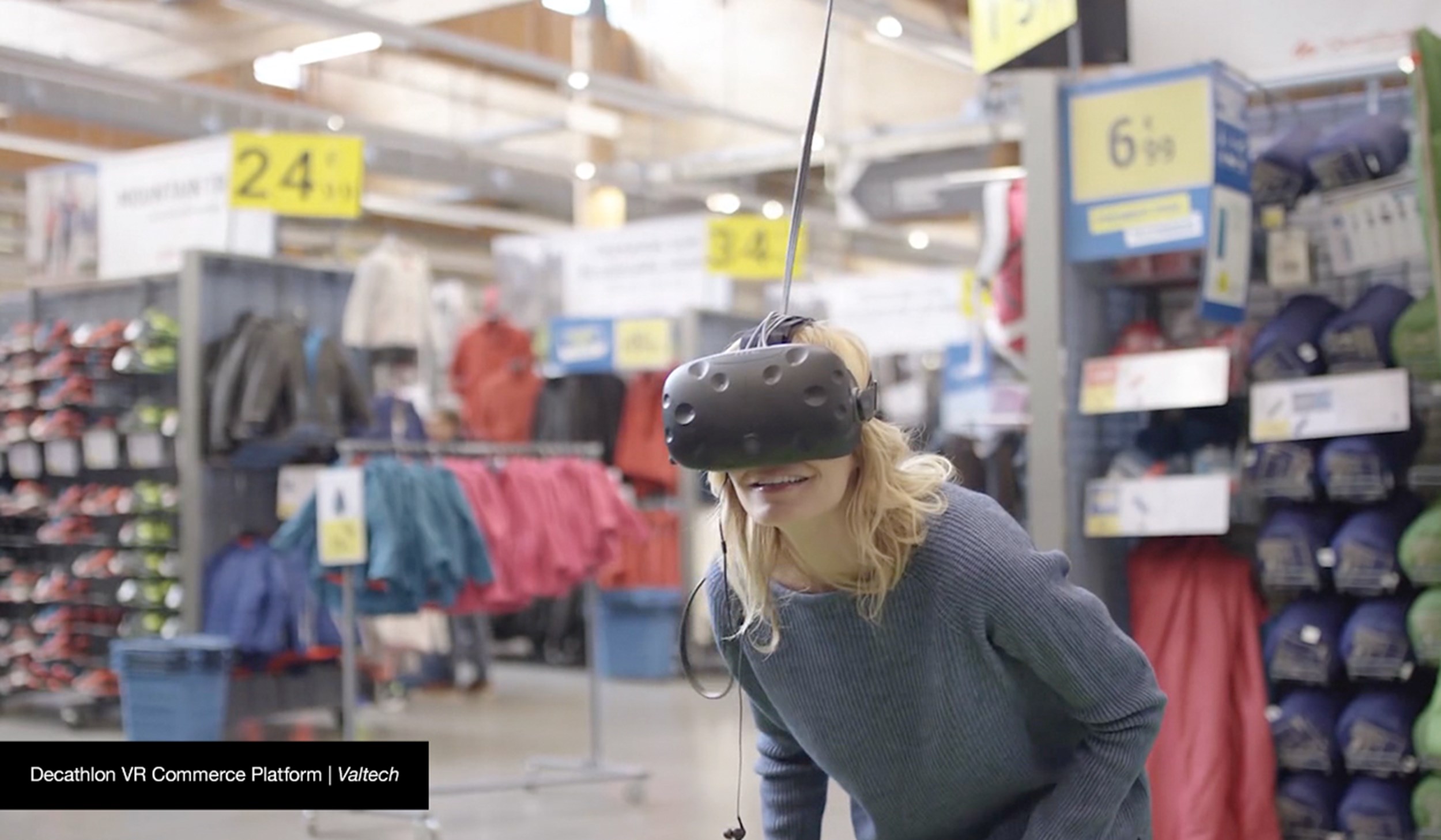 Woman using VR in Decathlon store