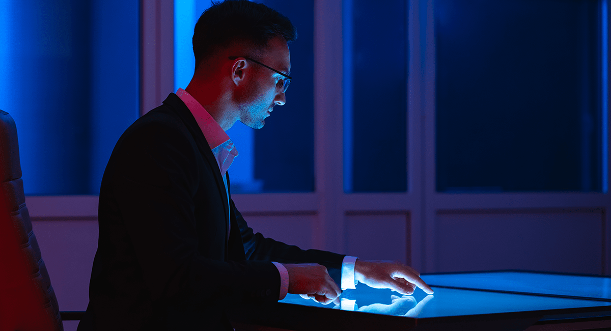 Man working on a touchscreen table