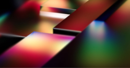 An abstract image featuring vibrant, multicolored 3D blocks with smooth surfaces and blurred edges. The colors blend seamlessly, creating a futuristic and dynamic composition. The blocks are arranged at varying angles, giving the image a sense of depth and movement. The design conveys innovation, creativity, and modernity, evoking themes of technology and digital transformation.