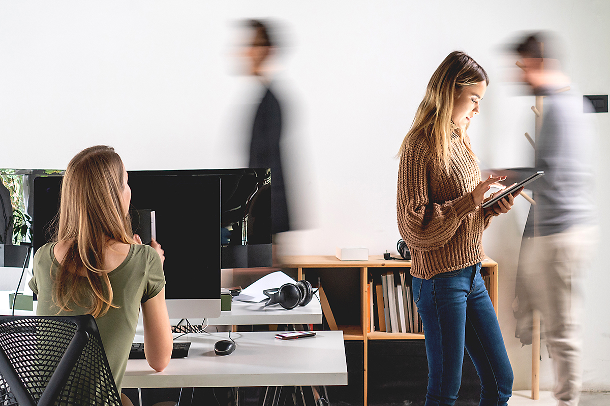 A woman at her desk in a fast world