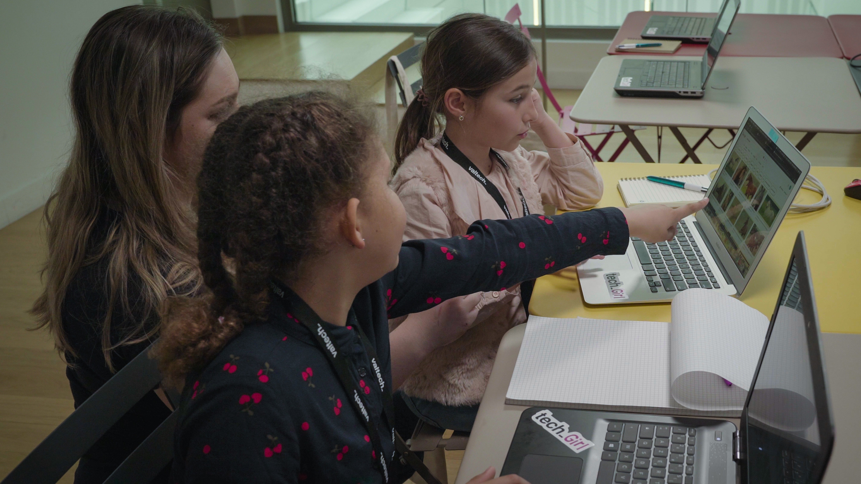 Girls working at a computer 