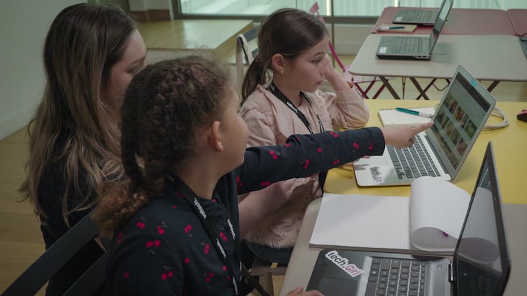 Girls working at a computer