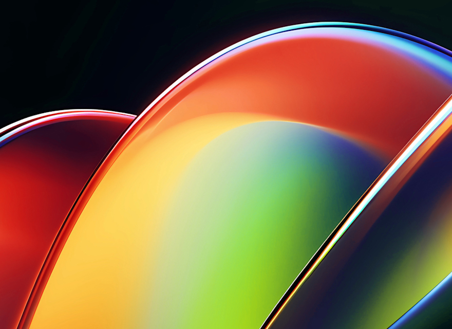 An abstract image featuring smooth, overlapping curved shapes with glossy, reflective surfaces. The colors transition from vibrant reds and oranges on the left to bright yellows, greens, and deep blues on the right. The design creates a sense of fluidity and motion, with the light reflecting off the curves to emphasize their sleek, polished appearance. The dark background enhances the bright, bold colors, giving the image a modern and dynamic feel, often associated with technology and innovation.