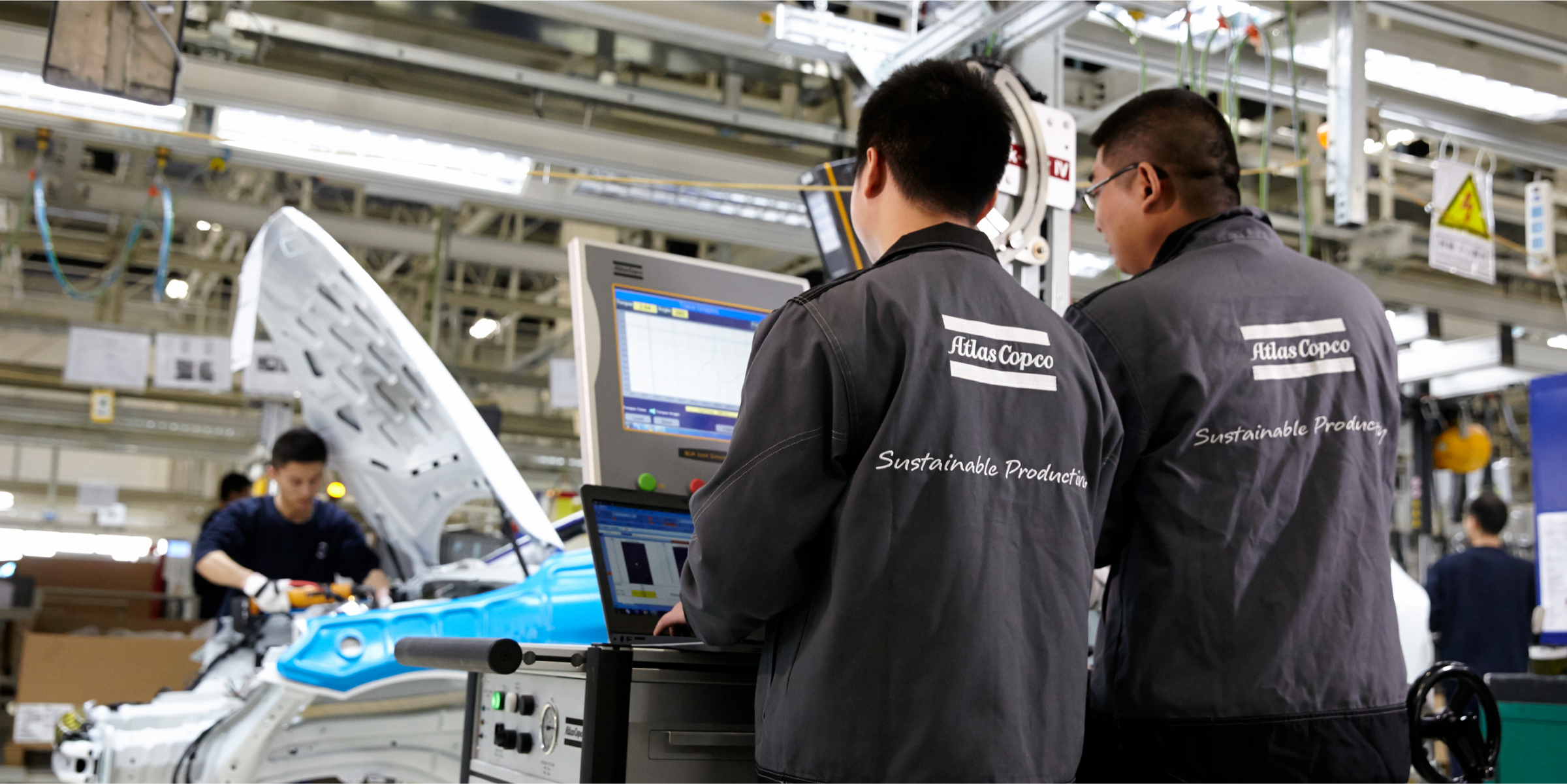 Atlas Copco team memnber making repairs