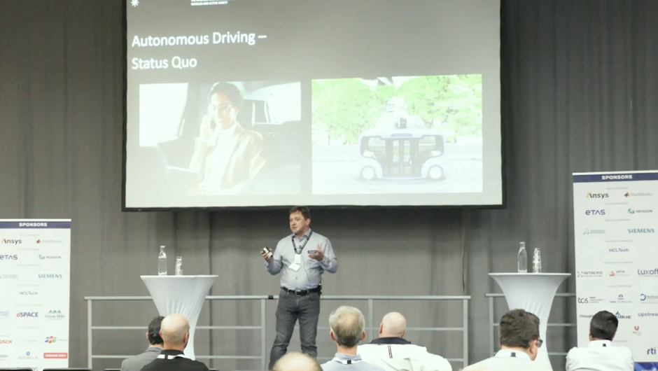 Peter Ivanov on stage at the VECS Mobility Conference