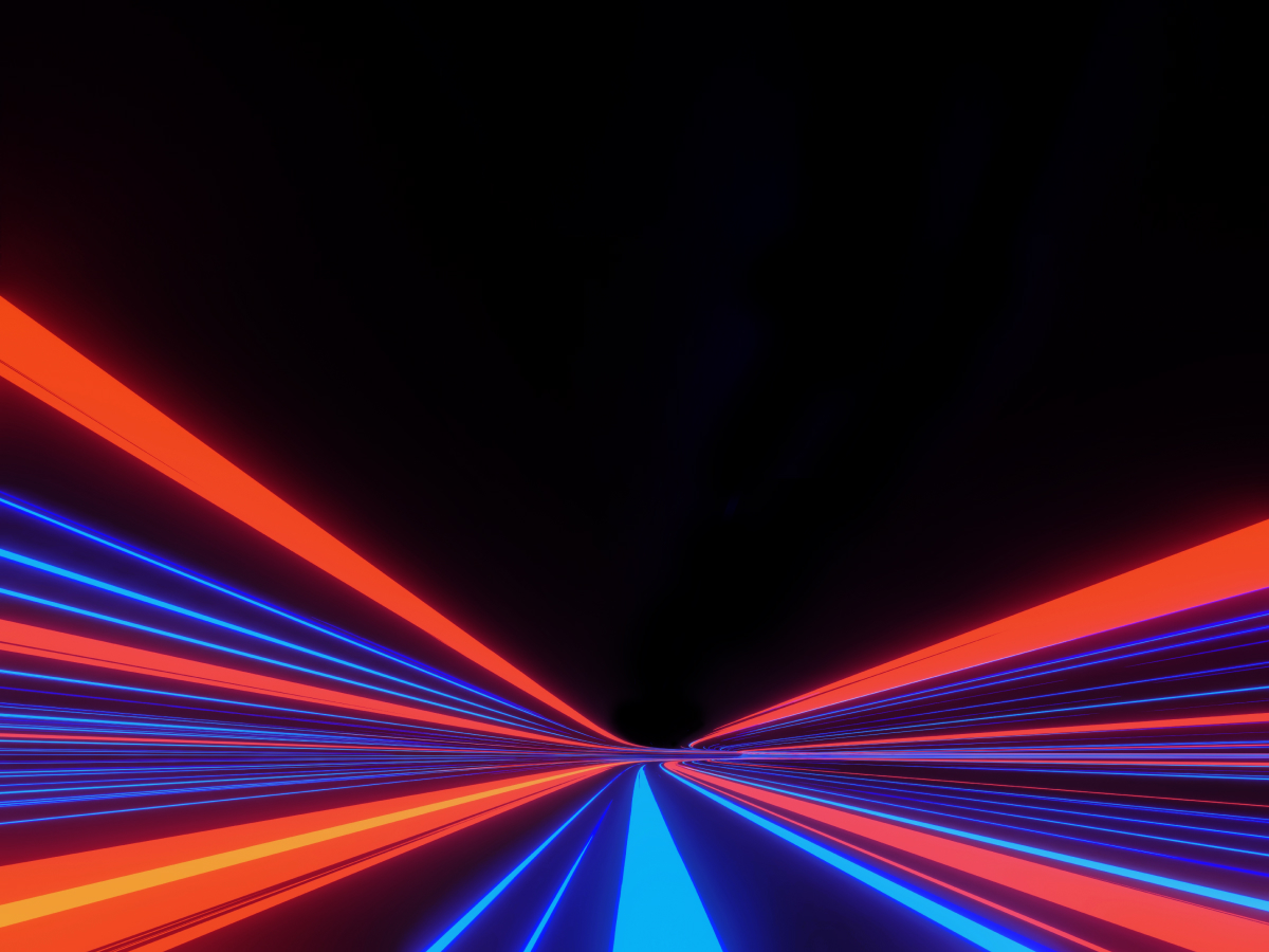 A dynamic digital illustration featuring red and blue neon light streaks converging towards a central vanishing point against a black background. The design symbolizes speed, digital transformation, and futuristic innovation, making it ideal for technology and business conference themes.