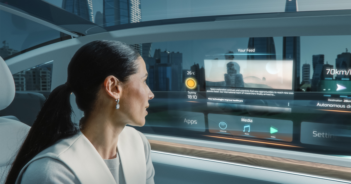 A woman sitting in an autonomous car with a sleek, modern interior, looking at an advanced digital dashboard display that shows various apps, media options, and navigation information against a backdrop of a futuristic city skyline.
